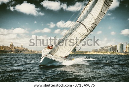 . Sailing yachts regatta.  Yachting. Sailing. Toned image and blur. Retro style postcard.