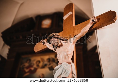 Crucifix, Jesus on the cross in church.