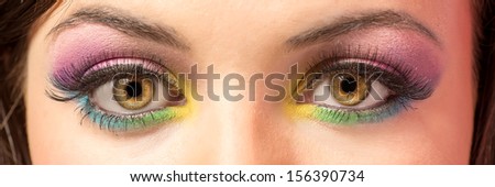 Female eyes with colorful eye-shadows