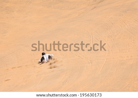 Sandboarding fun in Namibia, Africa