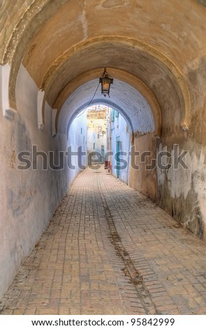 Kairouan القيروان (Documentary)  Stock-photo-old-narrow-street-in-kairouan-tunisia-95842999