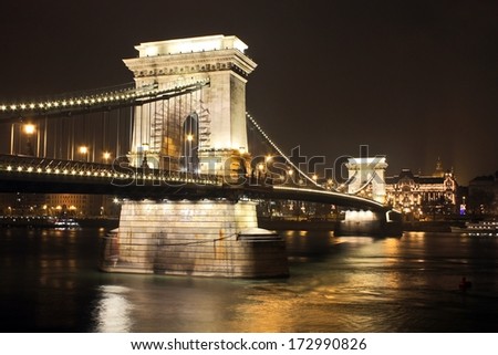 The Szechenyi Chain Bridge over Danube river in Budapest, Hungary - World famous  and beautiful  Hungarian Chain Bridge by night