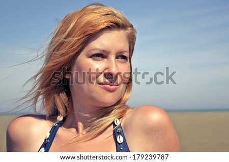 Beautiful smiling girl retro looking  portrait outdoor enjoying the sun by the sea - Young Caucasian woman fashion shoot portrait