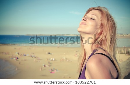 Beautiful woman outdoor sun enjoying on French riviera in retro tones - Caucasian female outdoor retro shoot by the sea