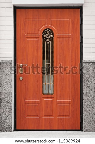 Brown front door - entrance to the building