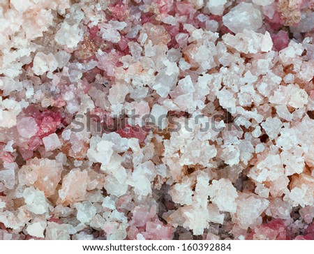 Natural salt with large pink crystals close up