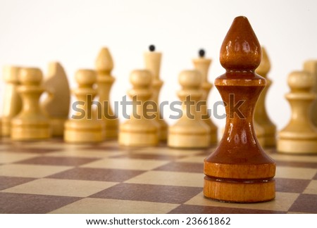 Brown chess bishop on a white background