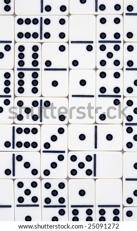 Background from white spotted dominoes pieces