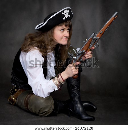 Girl - pirate on black with two pistols in hands