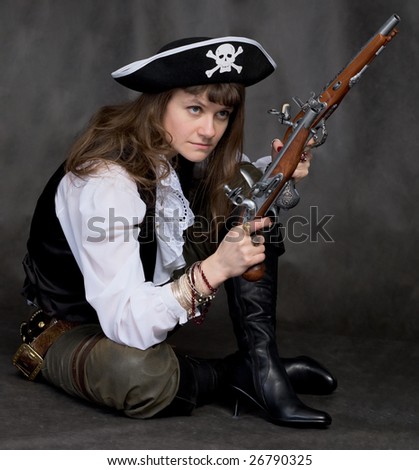 Girl - pirate on black with two pistols in hands