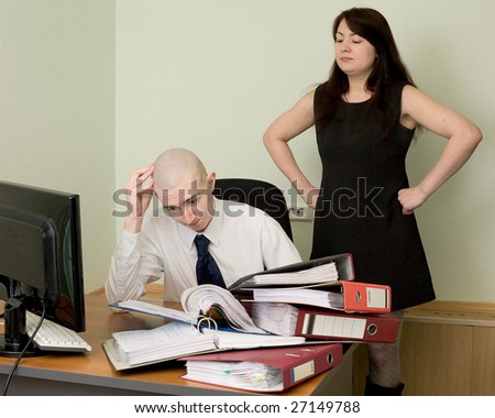 The bookkeeper and the secretary on a workplace at office