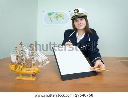 Girl - sea captain with a tablet and golden pen