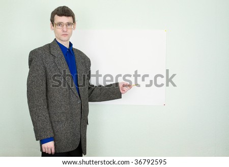 Funny teacher telling about something and showing on the poster