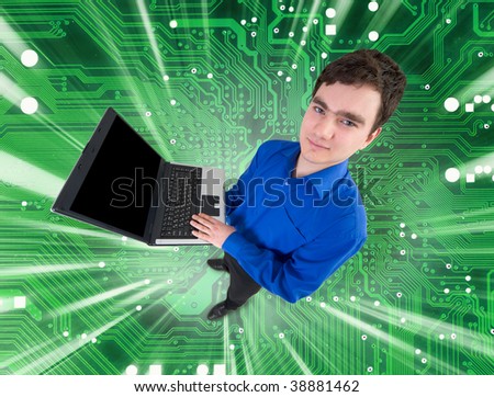 People with the laptop on a industrial electronic green background