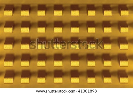 Macro-photo of a small golden metal radiator
