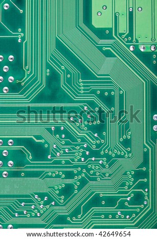 Green industrial texture of a electronic plate with paths