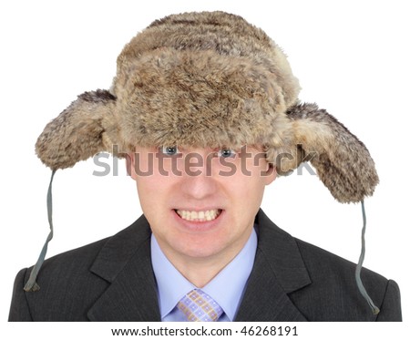 Angry Russian businessman in the fur hat on a white background