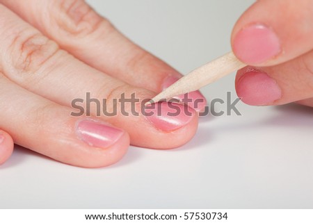 stock photo : Procedure for Nail Care - Cuticle removal stock photo : Procedure for Nail Care - Cuticle removal