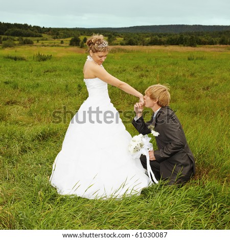 Groom to genuflect near the bride and kisses to it a hand