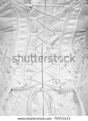 stock photo Corset of white wedding dress rear view