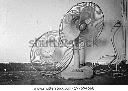 Dirty on old electric fan,Old electric fan, Cooling fan, Electric fan in hot weather. Process in Black and White color.