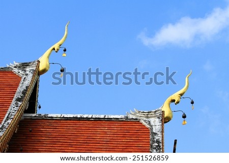 Roof style of Thai temple with gable apex on the top, The Naga gable apex on the top roof.