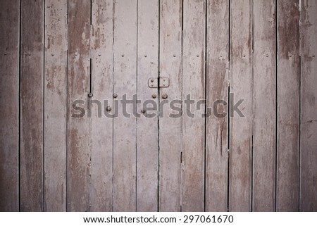 Old wooden gate with faded paint, Vintage wooden door.