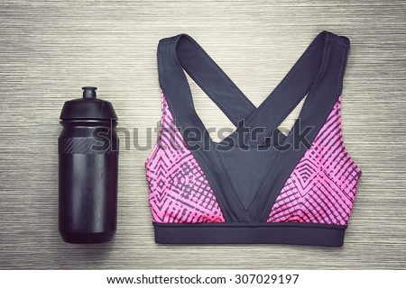 Women\'s sports bra and Black Bicycle water bottle. Sport wear, Sport fashion, Sport accessories, Sport equipment. (Vintage Style Color)