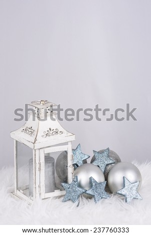Christmas decoration with lamp and balls in silver color and with red space for wishes