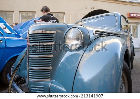 MOSCOW, RUSSIA - July 26, 2014:  Soviet car Moskvich-401 on retro rally Gorkyclassic about Gum, Moscow, fragment of the front view