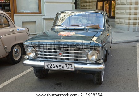 MOSCOW, RUSSIA - July 26, 2014: Soviet car Moskvich-408 on retro rally Gorkyclassic, GUM, Moscow, front view