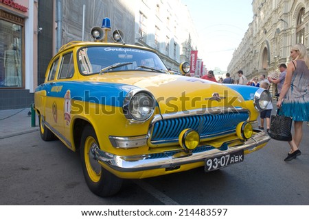 MOSCOW, RUSSIA - July 26, 2014:  Soviet police retro car Volga GAZ-21 rally Gorkyclassic in the Parking lot next to the Gum, Moscow, front view