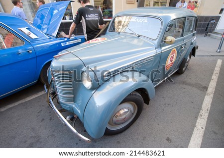 MOSCOW, RUSSIA - July 26, 2014:  Soviet car Moskvich-401 on retro rally Gorkyclassic, GUM, Moscow