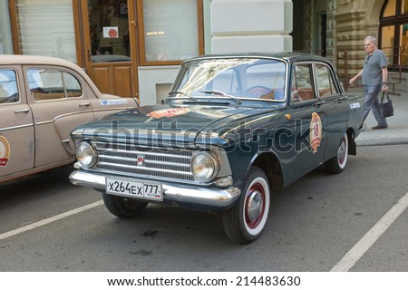 MOSCOW, RUSSIA - July 26, 2014: Soviet car Moskvich-408 on retro rally Gorkyclassic,  GUM, Moscow