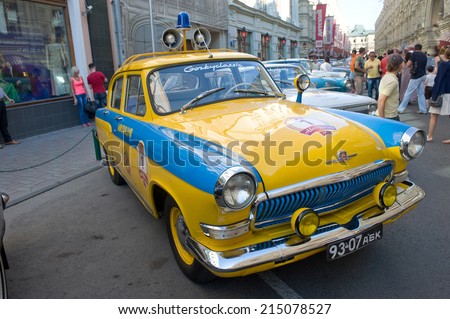 MOSCOW, RUSSIA - July 26, 2014:  Soviet old police car Volga GAZ-21 rally Gorkyclassic in the Parking lot next to the Gum Department store, Moscow