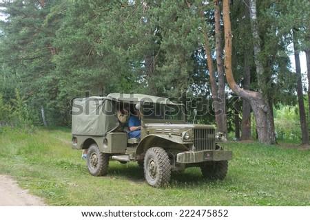 CHERNOGOLOVKA, MOSCOW REGION, RUSSIA-JUNE 21, 2013: American old car Dodge WC-51 near field road, 3rd international meeting \