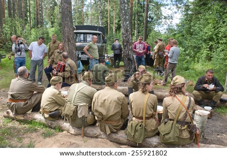 CHERNOGOLOVKA, MOSCOW REGION, RUSSIA - JUNE 21, 2013: Lunch and rest in the forest, 3rd international meeting \