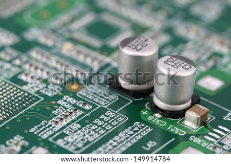 electrolytic capacitors,chip capacitors, and chip resistors mounted on a PCB