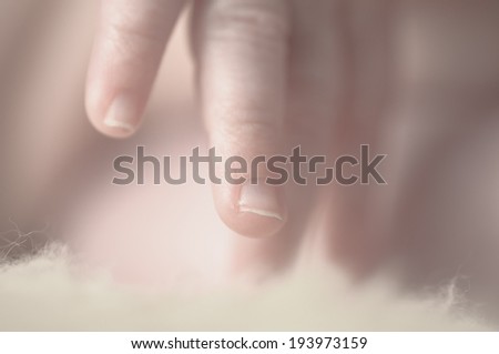 Close up of baby girls\' sweet little hand and fingers