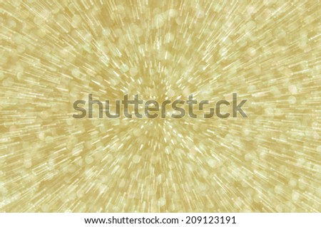 golden abstract explosion with defocused lights background