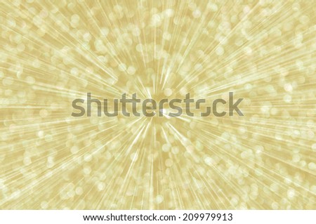 golden abstract explosion with defocused lights background