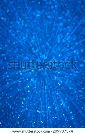 blue abstract explosion with defocused lights background