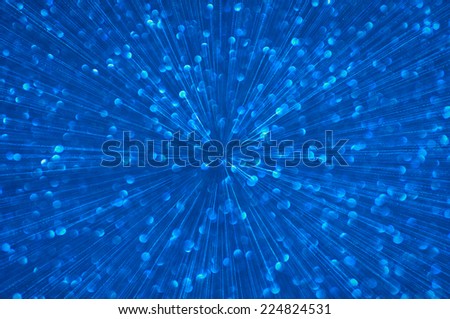 blue abstract explosion with defocused lights background