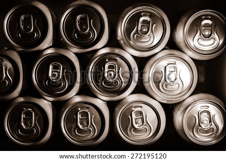 metal cans with refreshing drinks background