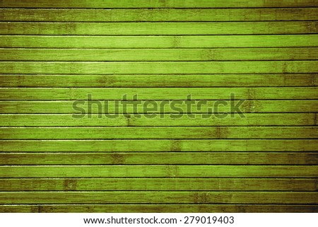 Tropical jungle background from horizontal planked green bamboo