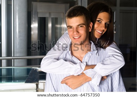 Happy successful business couple, in hug and love, chilling out.