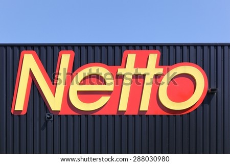 Belleville sur Saone, France - May 22, 2015: Netto logo on a facade. Netto is a French chain of hard discount stores owned by the Les Mousquetaires group.