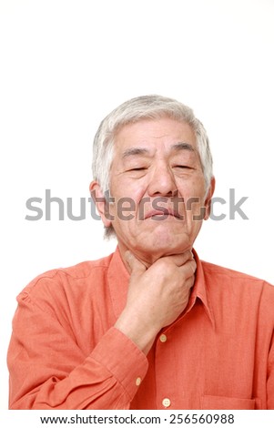 senior Japanese man having throat pain