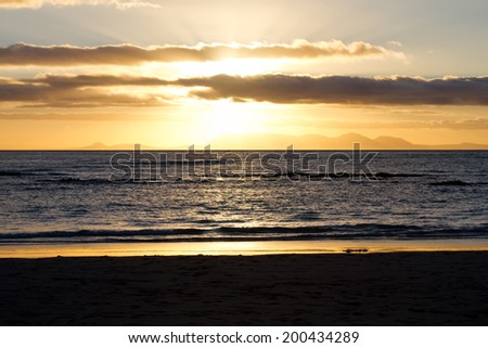 Cloudy sunset over Gordon\'s Bay, False Bay, South Africa