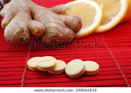 tablets of herb medicines with ginger. chinese medicine